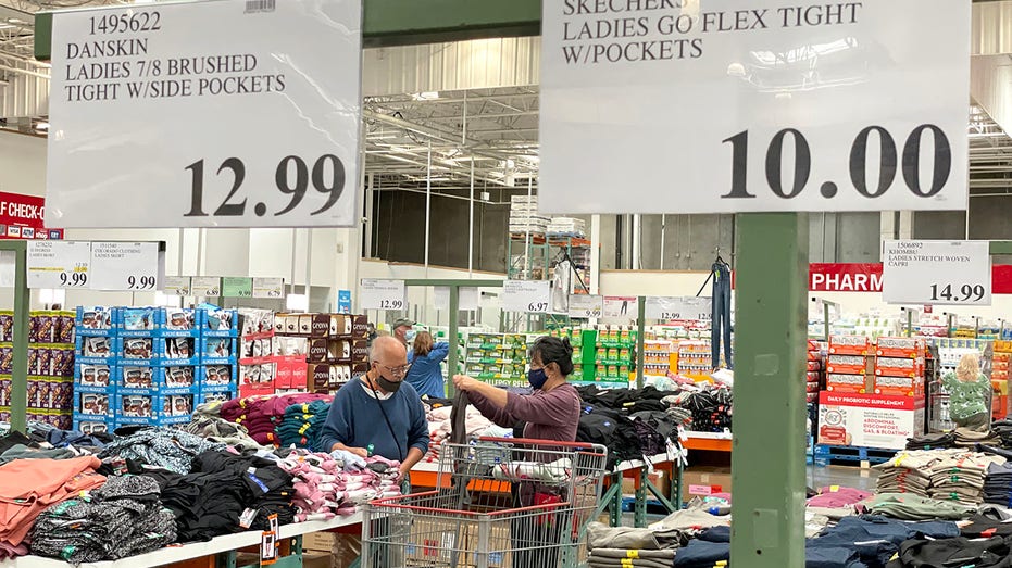 Costco customers check out items